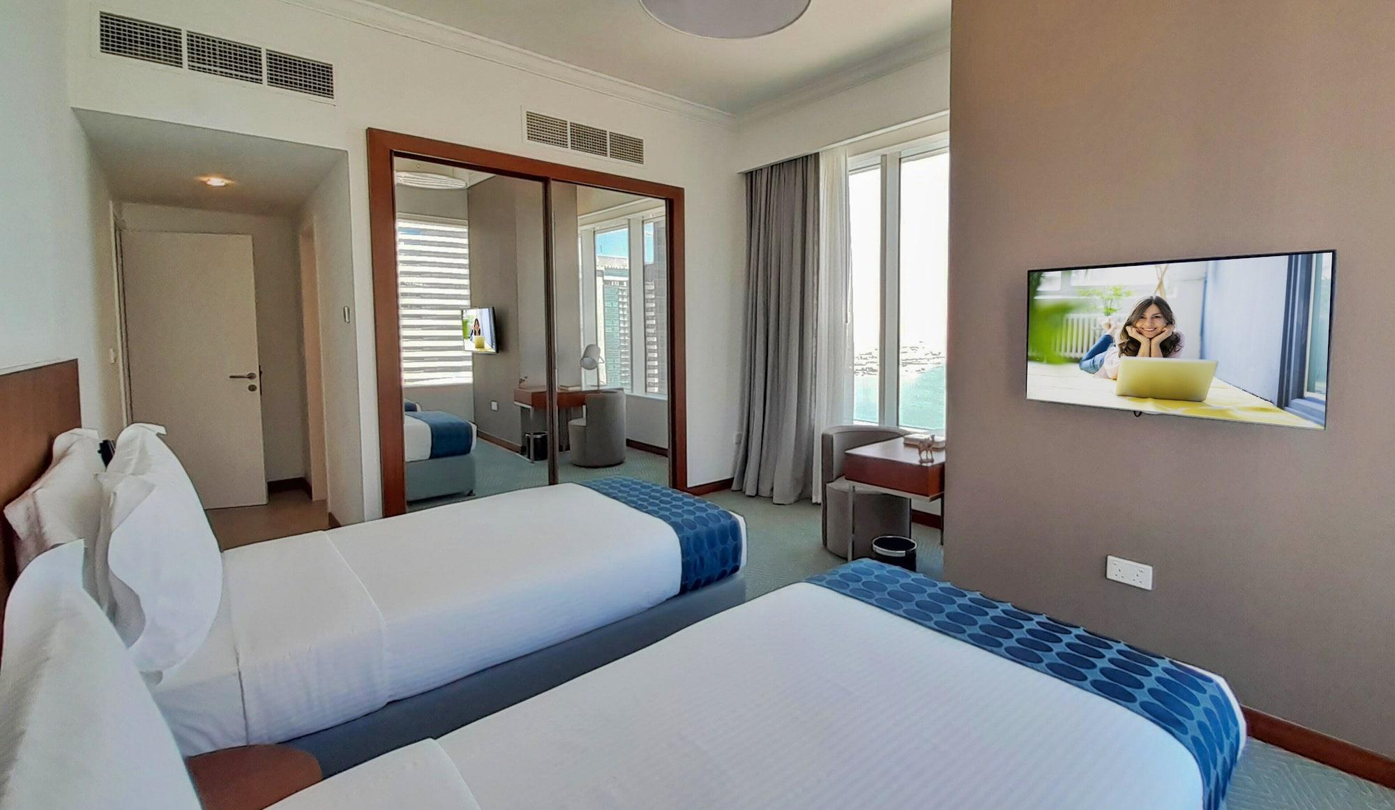Somerset West Bay Doha Exterior foto A bedroom at the hotel