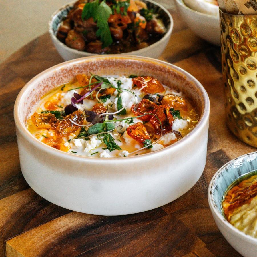 Somerset West Bay Doha Exterior foto Labneh with olive oil, sumac, and olives
