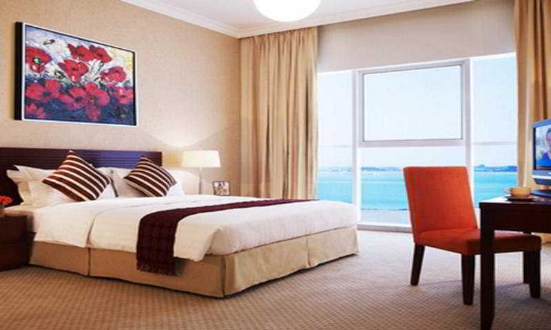 Somerset West Bay Doha Exterior foto A bedroom at the hotel
