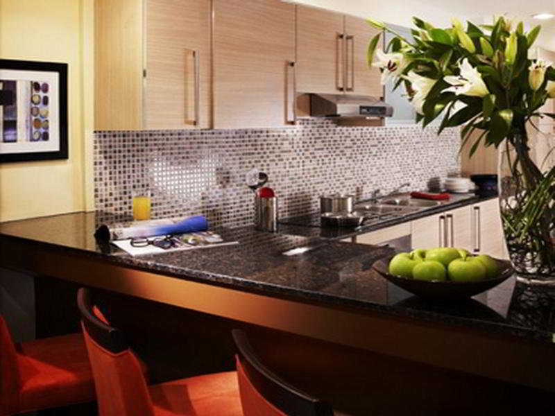 Somerset West Bay Doha Zimmer foto A kitchen at The Standard East Village