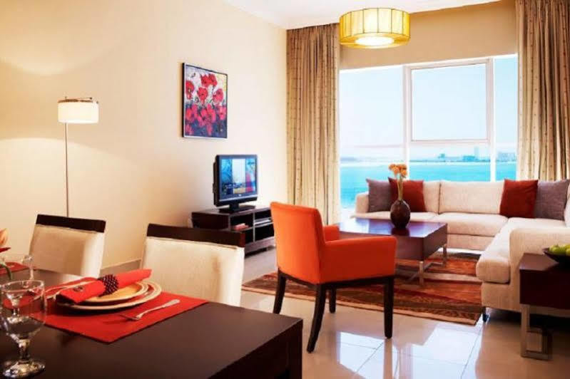 Somerset West Bay Doha Exterior foto A living room in a typical apartment